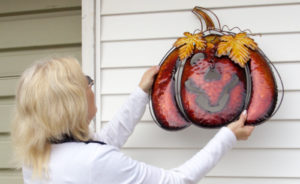 fall decorating with halloween decoration hanging from vz hang vinyl siding hook