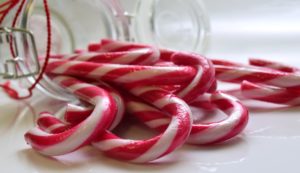 christmas traditions candy canes in a jar